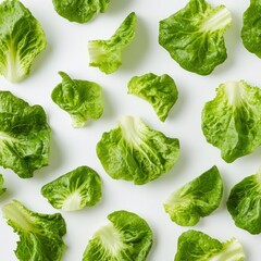 Fresh lettuce leaves pattern, white background, food photography, healthy eating (2)