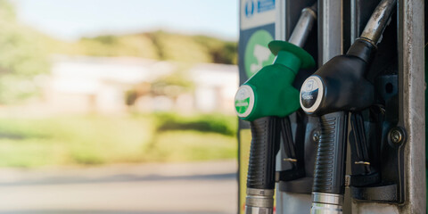 Fueling vehicles at a gas station in a sunny area during the day