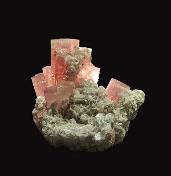 Close-Up View of Elbaite, Microlite, Quartz, and Mica Mineral Specimen on Dark Background