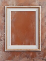 Fototapeta premium A terracotta-painted textured wall with golden decor accents and a centered white frame.