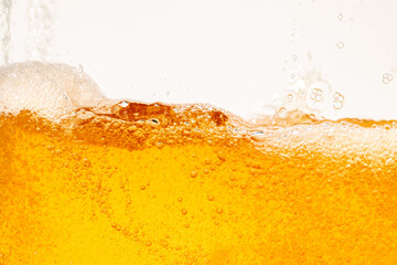 Close up bright orange Oil or beer splash texture and nature waves, Beautiful waves curve and...