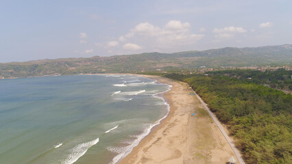 aerial seascape sand beach with turquoise water, Teleng Ria, Pacitan. Seascape, ocean and beautiful beach. Java Indonesia Travel concept.