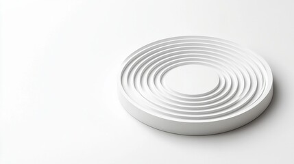 Obraz premium Elegant White Ceramic Dish with Layered Circular Design on Minimalist Background