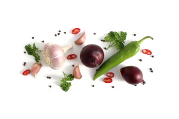Fresh ripe harvest of vegetables lies on a white isolated background.	