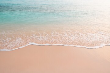 Gentle waves lap against soft, sandy shore, creating tranquil co