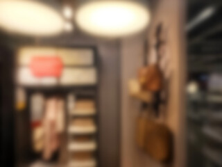 Fototapeta premium Blurred Walk In Closet in the Warm Light Background.