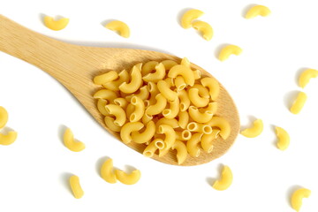 A pile of dry pasta lies on a wooden spoon on a white background.