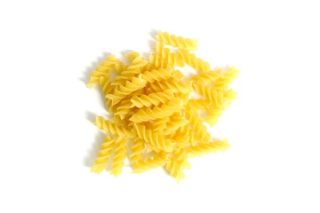 A pile of dry pasta lies on a white background.