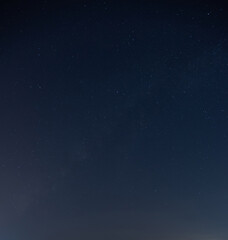 very beautiful  night blue sky and star background.with grain and select white balance.