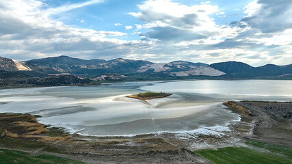 Obraz premium Aerial drone panorama landscape of Lake Yarisli (aka Yarışlı Gölü) at sunset, Yesilova, Burdur, Turkey