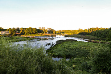 Landscape view with river Venta historic rapid - widest rapid in Europe.
