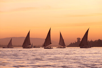 Tourists in a Felucca boat on the Nile River in Luxor Thebes - Egypt
