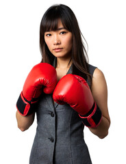 A woman in a grey suit and red boxing gloves stands against a white background. She has straight hair.