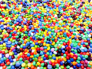 Colorful masterbatch granule, mix color polypropylene polymer granules, cold cutting type granule texture, isolated on white background, for industrial plastic company profile product catalog design