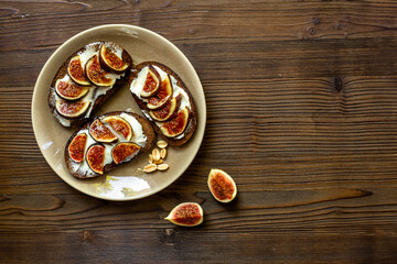 Fig sandwiches with cheese and honey for breakfast. Top view