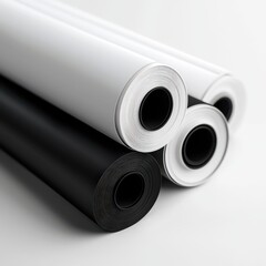 Fototapeta premium A close-up of rolled black and white paper, showcasing a sleek, modern aesthetic perfect for art or design projects.