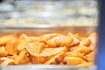 Baked pumpkin in close-up at the charity canteen. With space to copy. High quality photo
