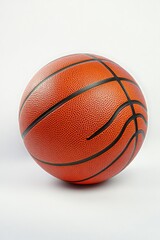 Obraz premium A detailed view of a basketball on a white background, ideal for sports-themed designs and illustrations