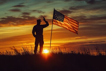 A person holding an American flag during a beautiful sunset