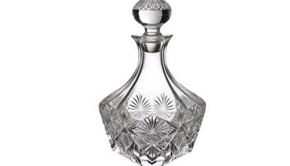 Elegant crystal decanter with stopper, featuring intricate design and clear glass png
