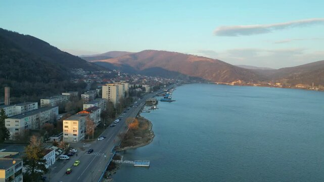 Orsova City  is beautiful city located in western Romania , a travel destination  on the shore of the Danube river , aerial view.