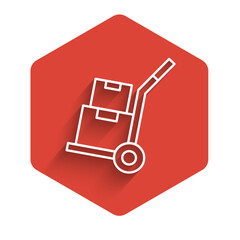 White line Hand truck and boxes icon isolated with long shadow background. Dolly symbol. Red hexagon button. Vector