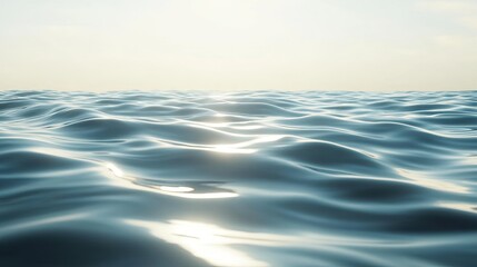 Obraz premium Gentle Ocean Waves Reflecting Soft Sunlight on a Calm Horizon