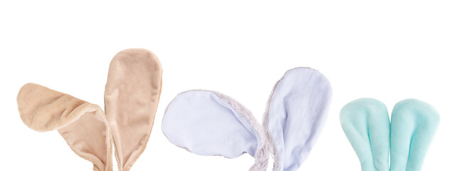 Collection or set of different fluffy soft festive bunny or baby rabbit toy ears of brown, purple and blue colour isolated on white background used as design element for easter holiday celebration