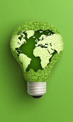 Green world map shaped like a lightbulb on green background for eco-conscious concepts