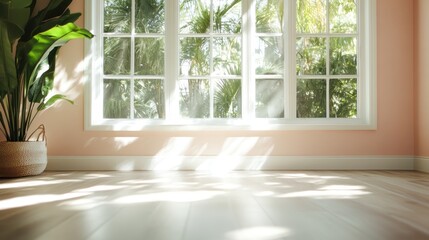 The image depicts a bright room with large windows and soft pink walls, allowing sunlight to flood in and showcasing lush greenery just outside.