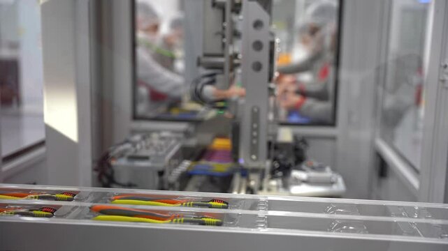 Toothbrush production with autonomous machines. Toothbrush production factory.