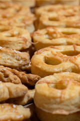 Freshly baked pretzel-shaped cheese biscuits
