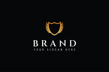 Golden shield frame logo with wings