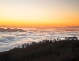 Fototapeta premium Breathtaking view of a sunrise over a sea of clouds with mountains in the distance