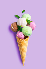 Ice cream scoops in waffle cone