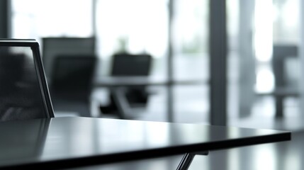 Empty office desk with vacant chairs and monitors, symbolizing layoffs and workplace downsizing. Concept of job loss, corporate restructuring, and economic uncertainty in modern business environment.
