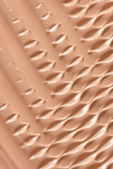 Liquid make up foundation or concealer cosmetic texture close up. Beauty abstract	