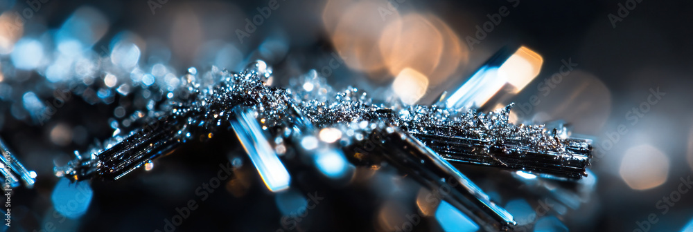 Poster microscopic image of metallic crystals with bokeh background