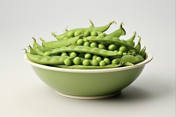Bowl of Fresh and Healthy Green Arveja Vegetable Peas, Raw and Isolated on Plate