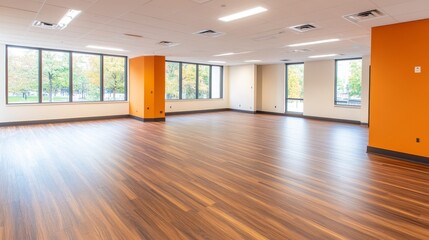 Obraz premium Spacious, modern office interior with wooden flooring and large windows showcasing autumn scenery