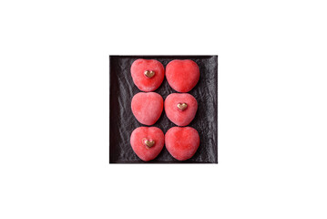 Delicious sweet mochi in the shape of red hearts