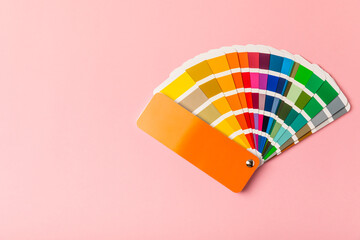 Color palette on a bright colored background. Color palette guide. paper catalog of rainbow color. creative.Palette, samples of trending colors. Color swatches. Decor and interior designer. Top view. 