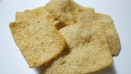 Kerupuk Gendar or Gendar cracker, are delicious Indonesian food for snacks. Isolated on white background