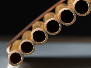 Closeup of a pan flute on a table