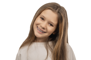 Portrait of a smiling little girl with braces on a transparent background.