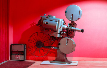 a beautiful reel projector of old films from old cinemas