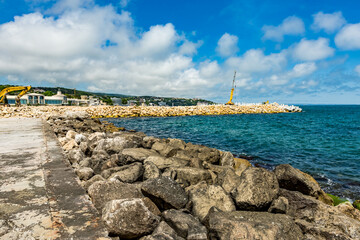 View of abandoned sea resort concrete buildings and structures in ruins near St. Constantine and Helena, city of Varna, Bulgaria, the shores of Black Sea, EU