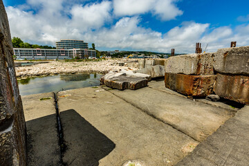 View of abandoned sea resort concrete buildings and structures in ruins near St. Constantine and Helena, city of Varna, Bulgaria, the shores of Black Sea, EU