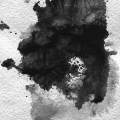 A watercolor background with black splashes
