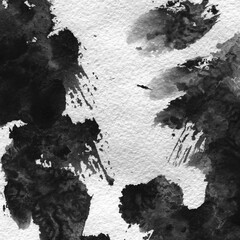A watercolor background with black splashes